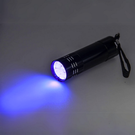 Ultraviolet UV flashlight for glowing colors